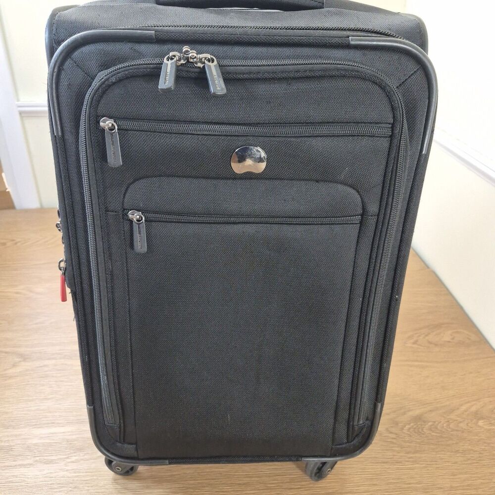DELSEY Paris Helium 24" Spinner Suitcase Black Travel Handled Bad